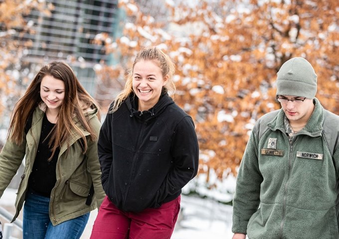 Norwich Cadets and Civilian Students Walking Campus Early Snowfall