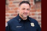 elliott moya headshot in police uniform