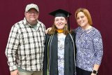 Ashley with family at graduation.