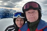 with wife in swiss alps