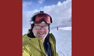 Chris Evans on a ski hill