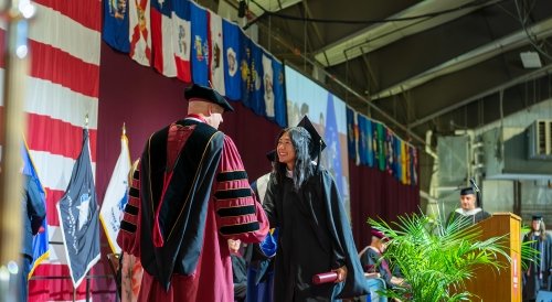 Student receives diploma