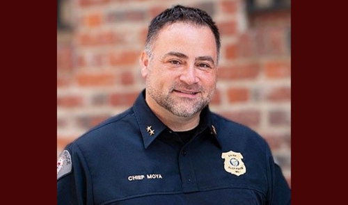 elliott moya headshot in police uniform