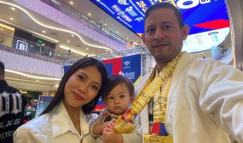 Daneil Fienco, wife, and baby, at Marianas Pro Mania