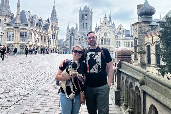 daniel pederson, wife, dog (pug) - in a city