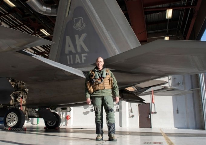 General Thomas Bussiere Norwich Class of 1985 Commander Air Force Global Strike Command Photo in front of Fighter Jet