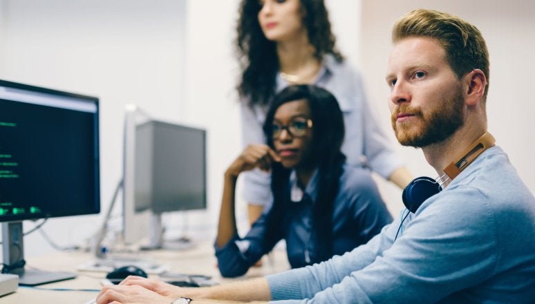 Human Aspects and Analytics - team working at computer work cluster