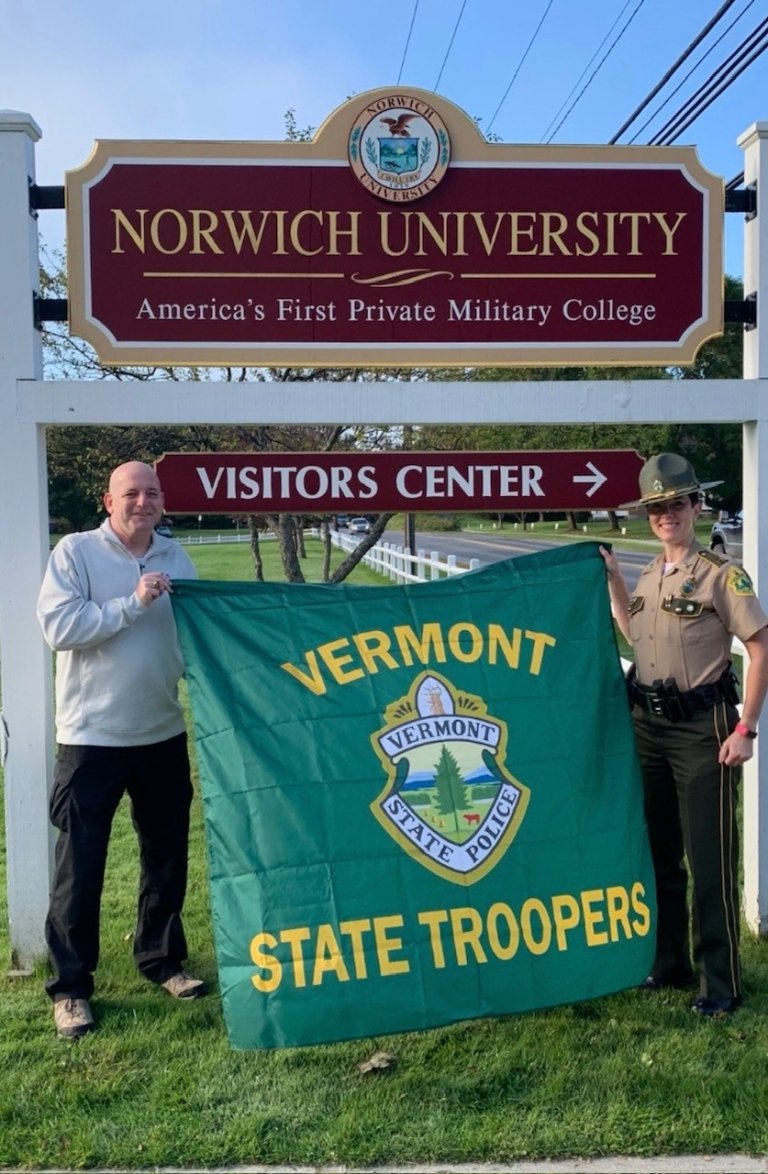 Matthew Bambrick vermont state trooper flag at Norwich visitor center