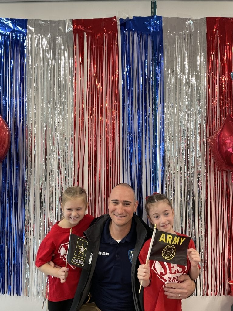 justin baum with his two children