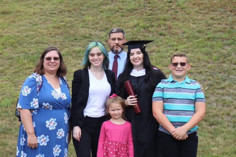 ashleigh with family at graduation