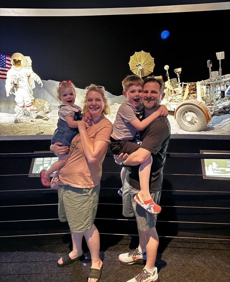 Chris and family at museum, space and moon landing 