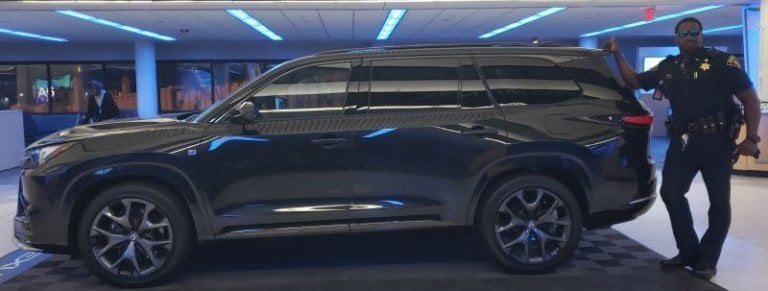 sim in uniform by car