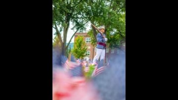 A senior cadet marches honor tours, guarding the memorial erected annually to acknowledge lives lost in the 9/11 terrorist attacks.